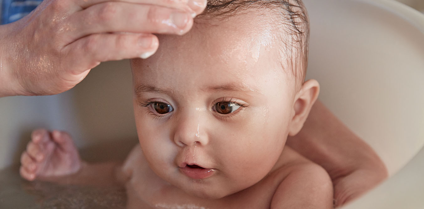 washing baby image